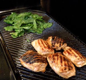 . . . teriyaki chicken and fresh spinach on the grill pan
